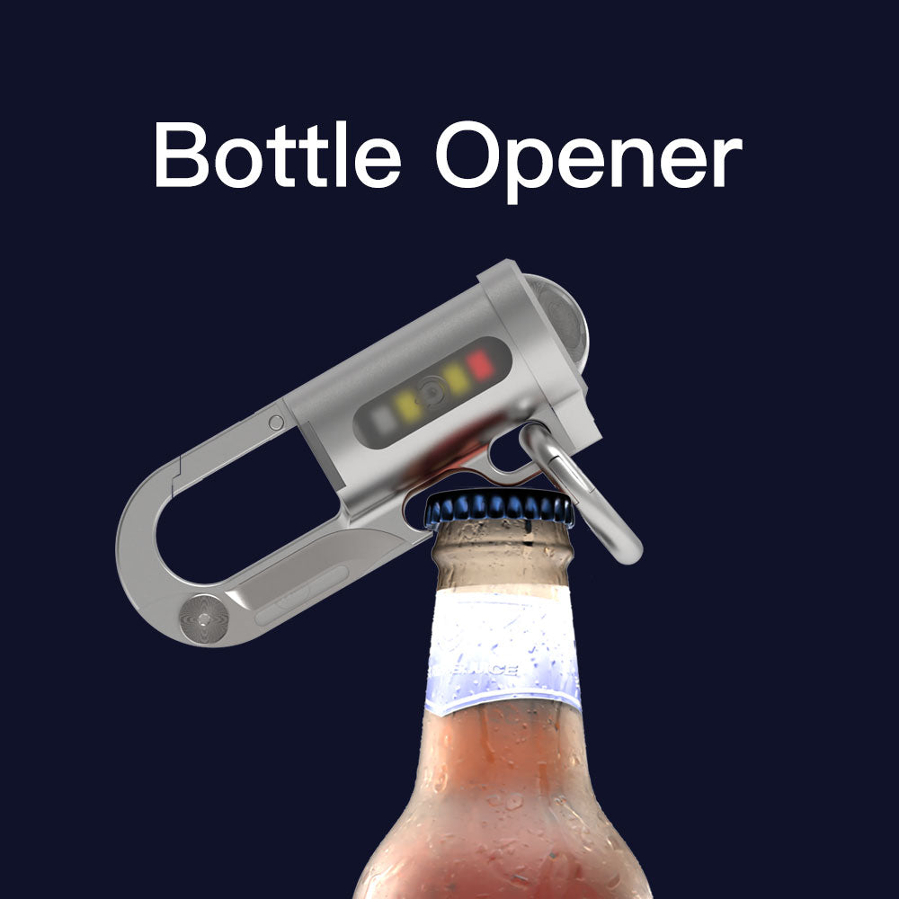 Bottle opener with carabiner attachment on a bottle against a dark background