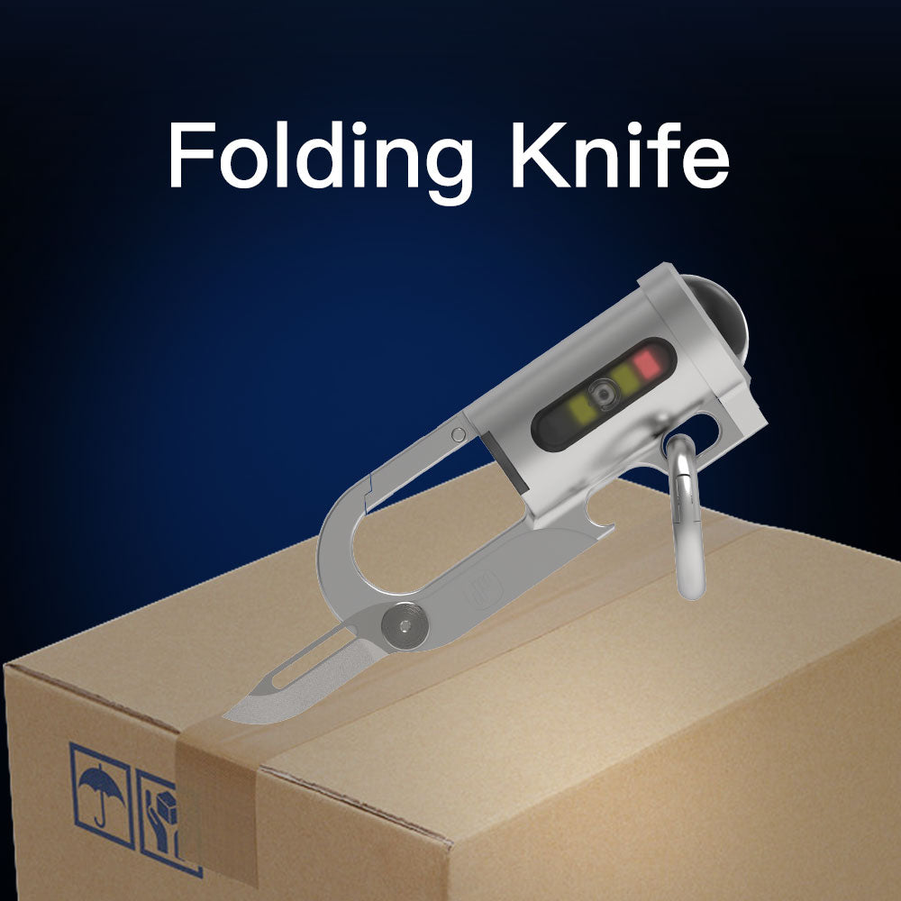 Folding knife on a cardboard box with a blue background
